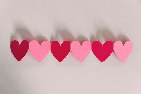 paper hearts cut together